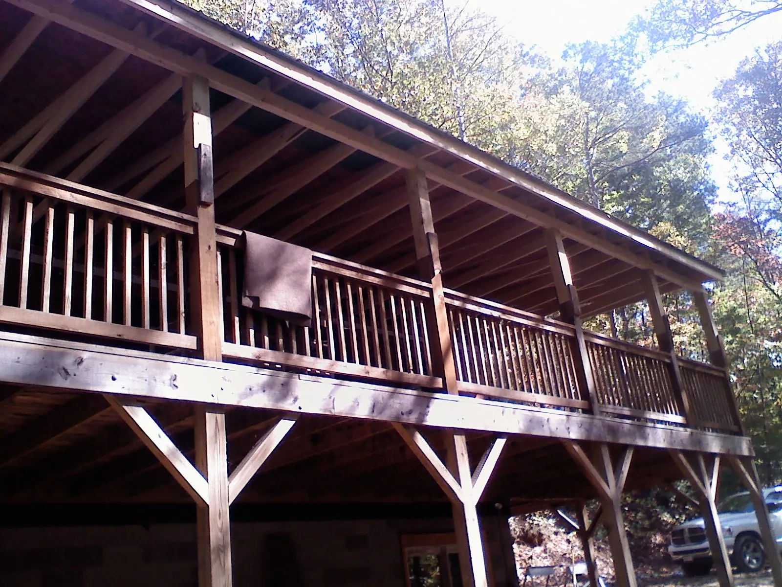 Timber framing under a new elevated porch and deck — Roof Leak Repair in Chapin by Roofing Brothers
